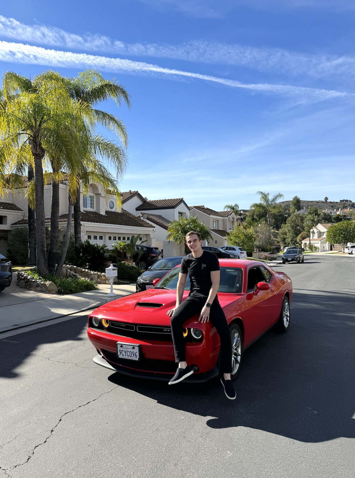 Bran Hrivnak with a Dodge Challenger in California